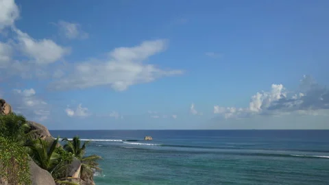 Beautiful ocean view with white clouds shot from high ground Video stock 111363960