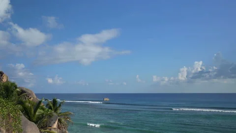 Beautiful ocean view with white clouds shot from high ground Video stock 111364182