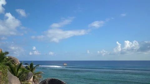Beautiful ocean view with white clouds shot from high ground Video stock 111364659