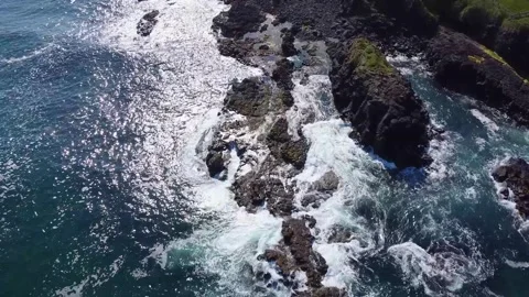Beautiful ocean waves and rocks drone footage from above northern ireland Video stock 209185967