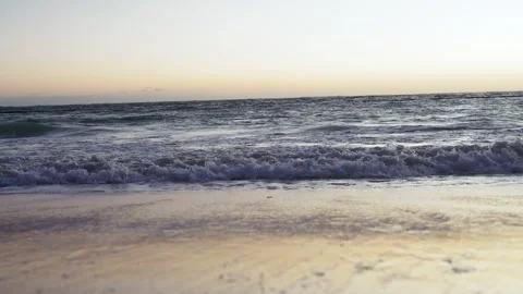 Beautiful ocean waves crash into a sandy beach during sunrise in tropical Punta Stock-Footage 300417884