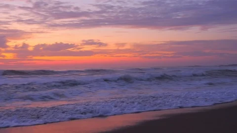 Beautiful ocean waves at sunset Stockbeeldmateriaal 121032680