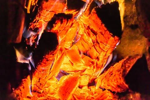 Beautiful old fireplace with light flame fire for heating building room Ilustración de archivo