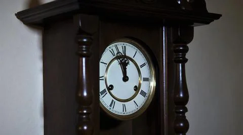 Beautiful old pendel clock -  shortly before 12 Stock Photos