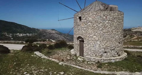 Beautiful Old Stone Windmill on Mountain Top Greece Stock Footage 106338854
