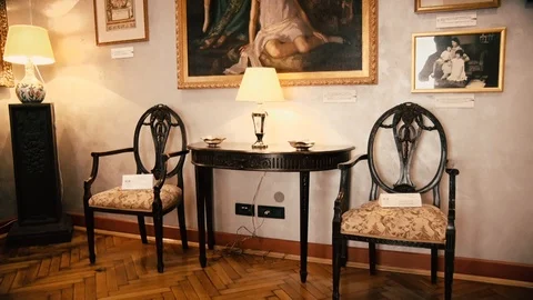 Beautiful Old Table and two Chairs with a Lamp from 19 century Vídeo Stock 95776862
