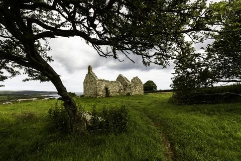 Beautiful old welsh chapel or church, ruin, sky as copyspace top, framed by.. Stock Photos