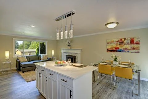 Beautiful open plan second floor living room, kitchen and dining space. Kitch Stock Photos