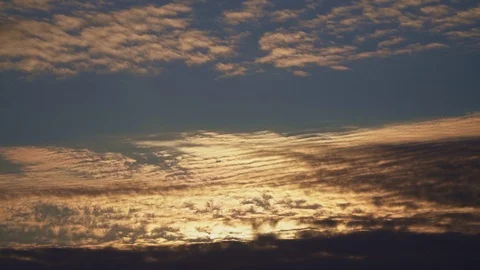 Beautiful orange and dark clouds fly in the sky Stock Footage 107850717