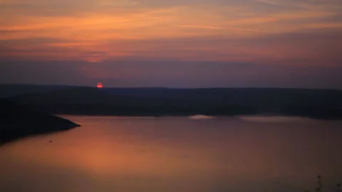 Beautiful orange sunset over the river. Stock Footage 90451859