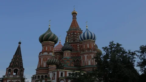 Beautiful orthodox cathedral surrounded by clear blue sky and fluffy clouds Stock Footage 101834452