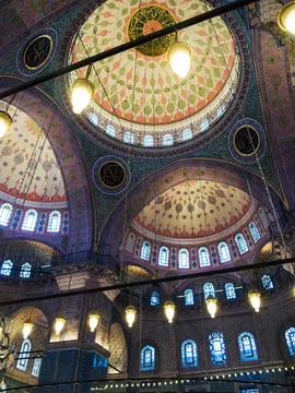 Beautiful painted ceiling under the domes in the mosque Stock Photos