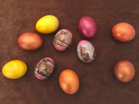 Beautiful painted Easter eggs on a brown background. Greeting card with Easte Stock Photos