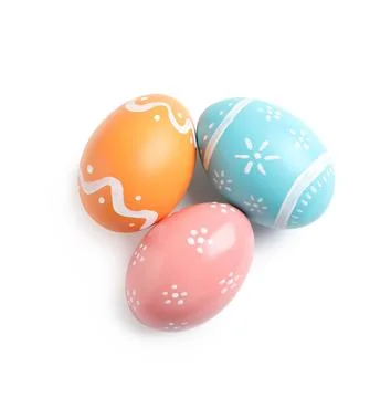 Beautiful painted Easter eggs on white background, top view Stock Photos