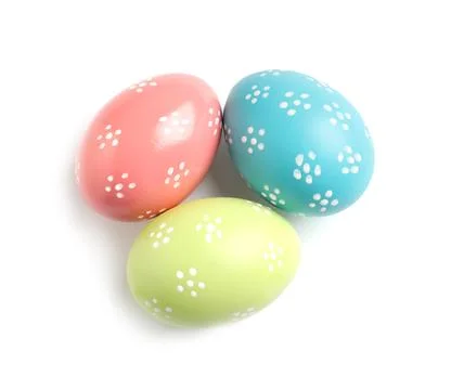 Beautiful painted Easter eggs on white background, top view Stock Photos