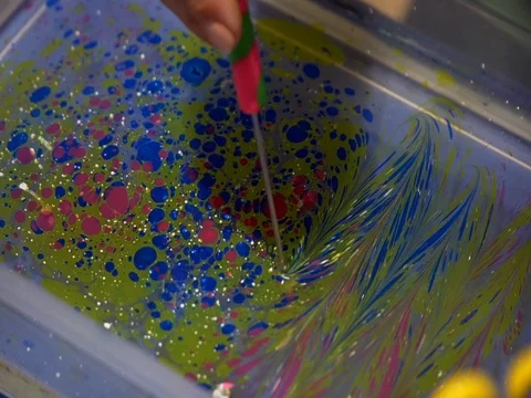 Beautiful painting on water close-up Stock Footage 80228809