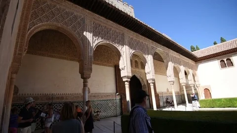 Beautiful Pan shot of interior square fountain of Andualcia Alhambra Stock Footage 74480573