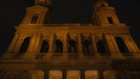 Beautiful Pan Shot of Saint-Sulpice Church Facade Illuminated at Night in Paris Stock Footage 319244686