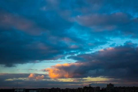 Beautiful panorama of the evening dramatic sky. Sunset or sunrise time. Ama.. Stock Photos