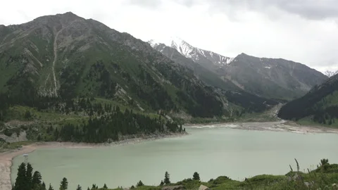 Beautiful panorama of a mountain lake on a cloudy day 3 Stock Footage