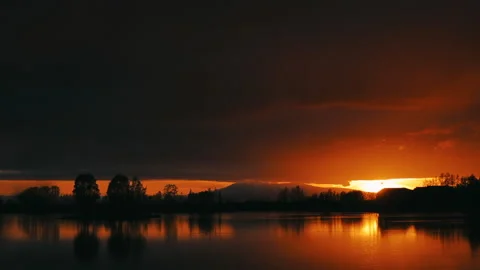 Beautiful panoramic sunset reflecting on small pond in North Pole, Alaska. Stock-Footage 139150010