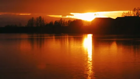 Beautiful panoramic sunset reflecting on small pond in North Pole, Alaska. Stock Footage 139150108