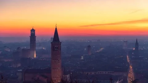 Beautiful panoramic sunset view of old town of Verona, Torre Lamberti Stock Photos