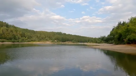 Beautiful panoramic view of a calm mountain lake 스톡 동영상 345650939