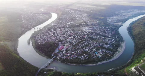 Beautiful panoramic view from the drone to the river around the town Stock Footage 150479922