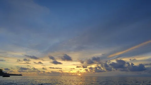 A beautiful panoramic view of ocean with small boats silhouettes and kayak Video stock 115033165