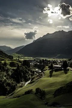 Beautiful Panoramic View over Old Cityscape and Golf Course with Mountainscape Fotos Stock