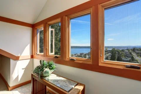Beautiful panoramic water view from the window. House exterior. Stock Photos