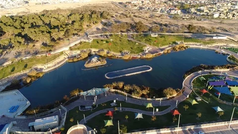 Beautiful park with a lake Stock Footage 99832487