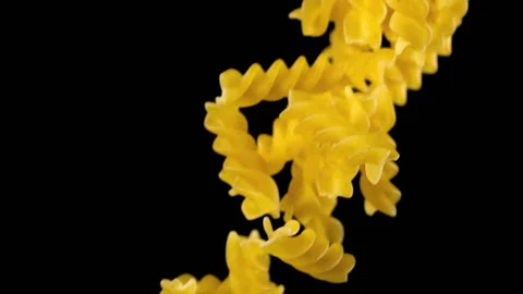 Beautiful pasta falling in slow motion Stock Footage 151108669