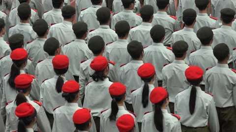 Beautiful pattern of Chinese students wearing army uniform and classic berets Stock Footage 60386679