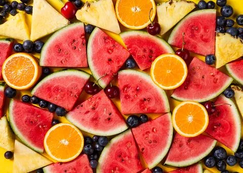 Beautiful pattern with fresh watermelon slices, pineapple, cherries and bla.. Stock Photos