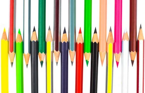 Beautiful pattern made with lot of different color pencil crayon on a white b Stock Photos