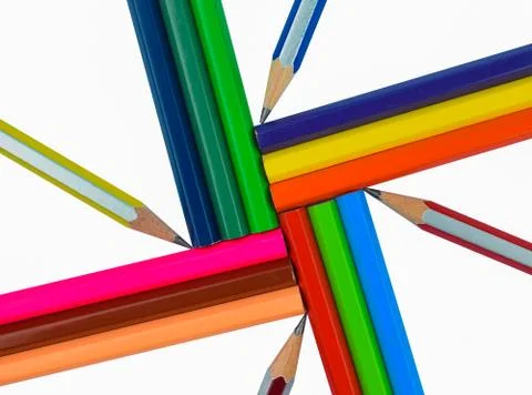 Beautiful pattern made with twelve different colored wood pencil crayons plac Stock Photos