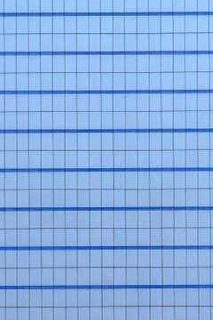 Beautiful pattern of office building windows glass texture. Stock Photos