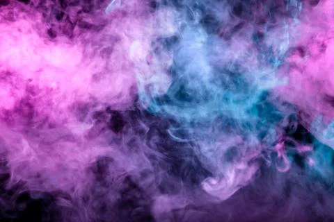 Beautiful pattern of smoke on a black background from the evaporating waves i Stock Photos