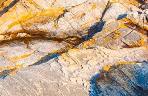 Beautiful pattern in stone at the coast Stock Photos