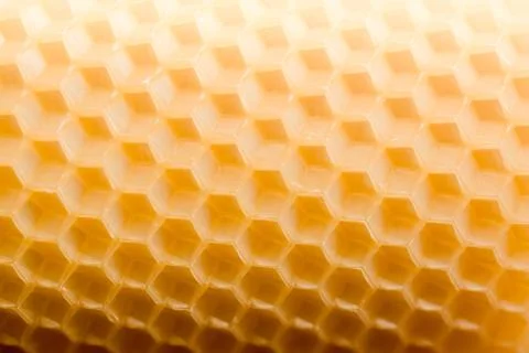 Beautiful pattern texture hexagonal honeycombs in saturated color. Stock Photos