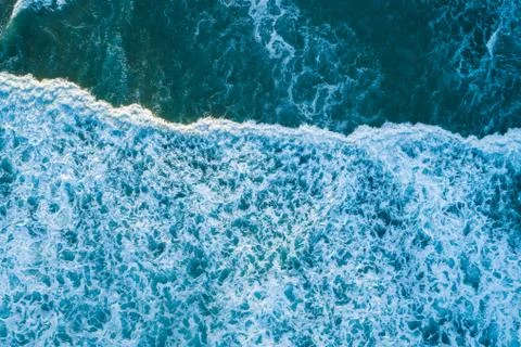 Beautiful pattern of white foam from ocean wave Stock-Fotos