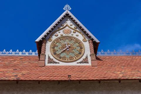 Beautiful patterned clock on a tower with Stock Photos