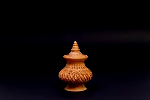 Beautiful patterned pottery isolated on a black background. Foto stock