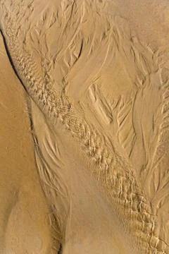 Beautiful patterns on the sand. Stock Photos