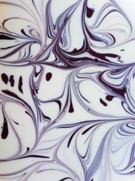 Beautiful patterns when mixing paints of different colors. Illustrazione stock