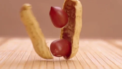 Beautiful peanut split in super slow motion Stock Footage 76888565