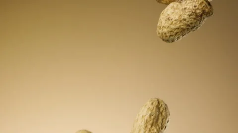 Beautiful peanuts falling in slow motion Stock Footage 150979601