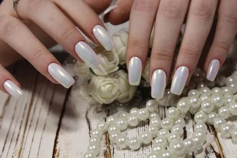 Beautiful pearl manicure Stock Photos